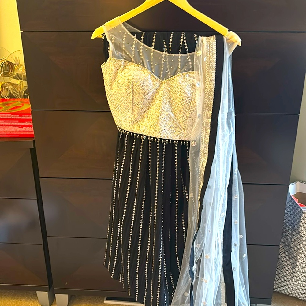 Brand new never worn beautiful black and silver lengha. Come with dupatta